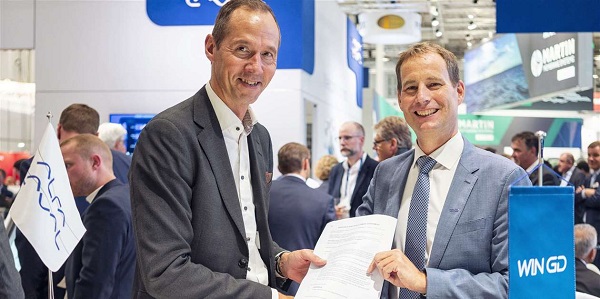 Peter Nielsen, President, Marine Separation & Heat Transfer Equipment, Alfa Laval & Dominik Schneiter, Vice President R&D, WinGD at signing new joint programme agreement at SMM 2022 Hamburg, Germany