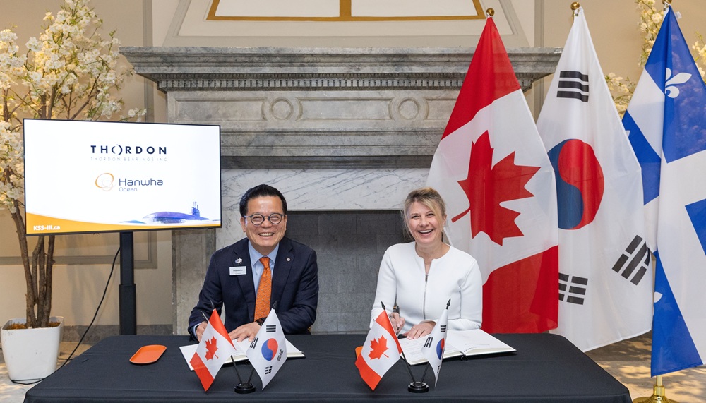 Charlie SC Eoh, President/COO of Naval Ship Business, Hanwha Ocean and Anna Galoni, CEO, Thordon Bearings sign MOU for Royal Canadian Navy Submarine project