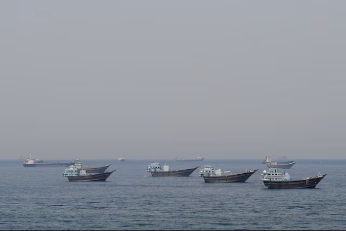 Ships and boats in the Strait of Hormuz off the coast of Musandam, Oman