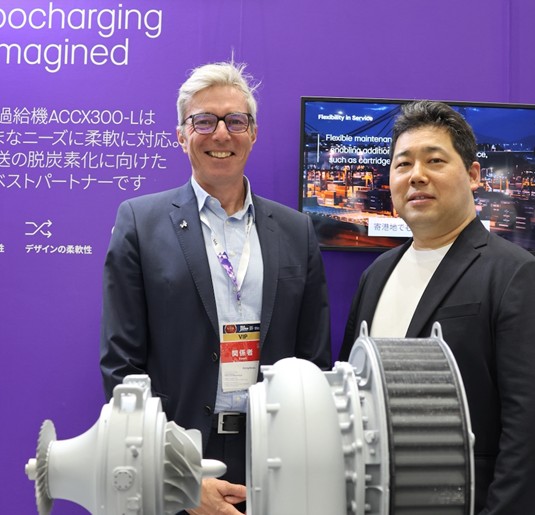 Pictured left to right: Christoph Rofka, President of the Medium- and Low-Speed Division at Accelleron, and Hitoshi Nakamura, Director for Carbon Neutral Port Promotion, Port and Harbor Bureau, City of Yokohama, at Sea Japan 2026.