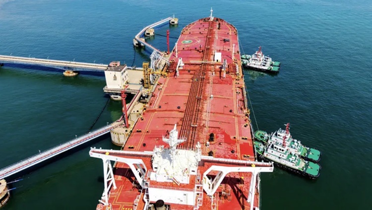 An oil tanker unloads imported crude oil at the Qingdao Port Oil Terminal in Shandong Province, China, on April 7 – Bloomberg